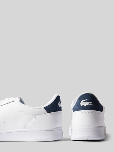 Peek & Cloppenburg LacosteLedersneaker mit Logo-Stitching Modell 'CARNABY' in weiss Fabrikpreis
