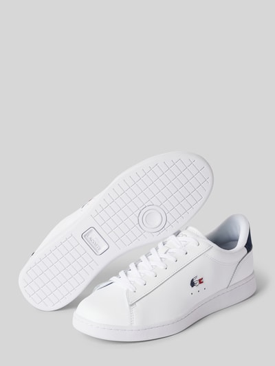 Peek & Cloppenburg LacosteLedersneaker mit Logo-Stitching Modell 'CARNABY' in weiss Fabrikpreis