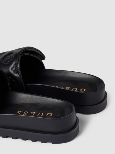 Peek & Cloppenburg GuessSandaletten mit Allover-Logo-Prägung Modell 'FABIO' in black Nur für heute
