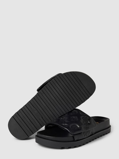 Peek & Cloppenburg GuessSandaletten mit Allover-Logo-Prägung Modell 'FABIO' in black Nur für heute
