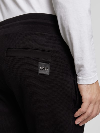 Peek & Cloppenburg BOSSSlim Fit Sweatpants mit Strukturmuster Modell 'Lamont' in black Verkauf