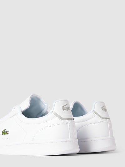 Peek & Cloppenburg LacosteSneaker mit Label-Print und Logo-Stitching Modell 'CARNABY' in weiss Nur noch ein Tag übrig
