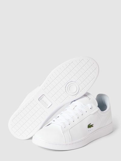 Peek & Cloppenburg LacosteSneaker mit Label-Print und Logo-Stitching Modell 'CARNABY' in weiss Nur noch ein Tag übrig
