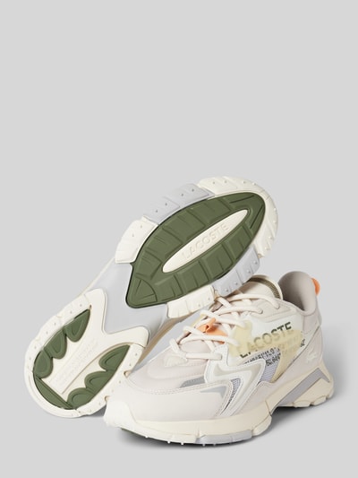 Peek & Cloppenburg LacosteSneaker mit Zugschlaufe Modell 'NEO TECH' in offwhite Exklusive Angebote