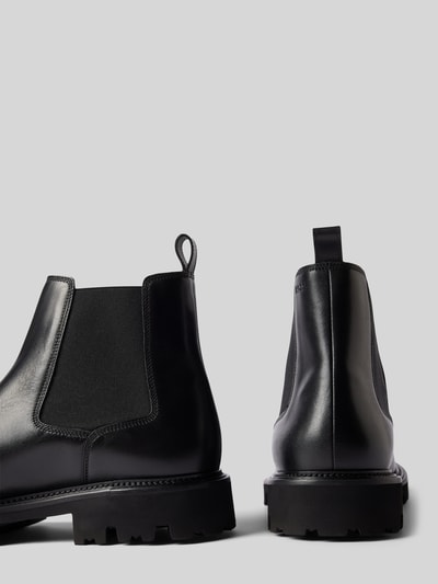 Peek & Cloppenburg BOSSChelsea Boots aus Leder mit Zugschlaufe Modell 'Julyo' in black Saisonschlussverkauf
